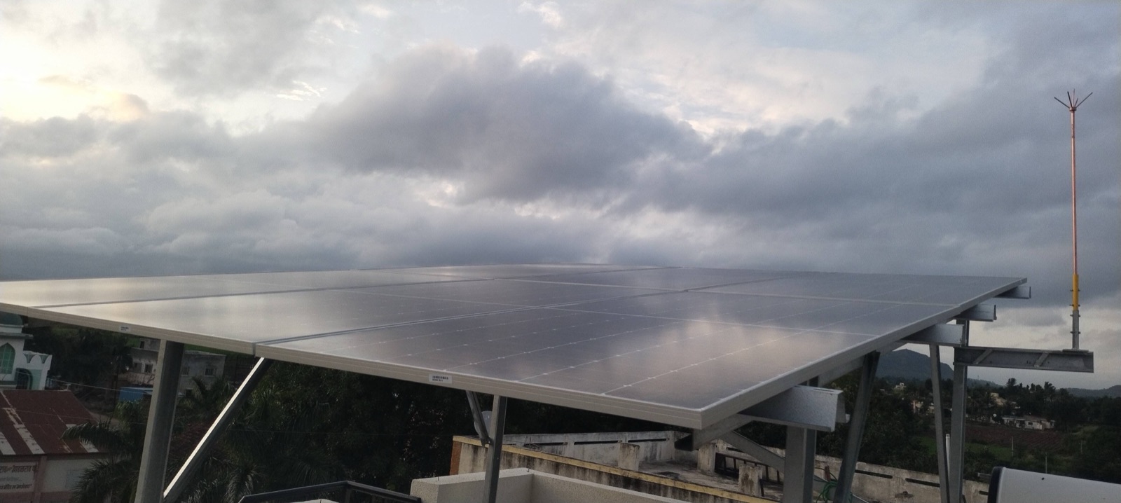 Rooftop solar panel installation in Ambegaon, Maharashtra